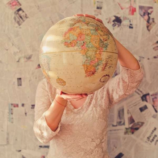 right time to travel the world globe